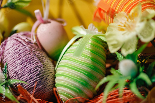 Eggs on a yellow background. Easter. Eggs. Bunny. Painted eggs. Holy day. People. Religion. photo