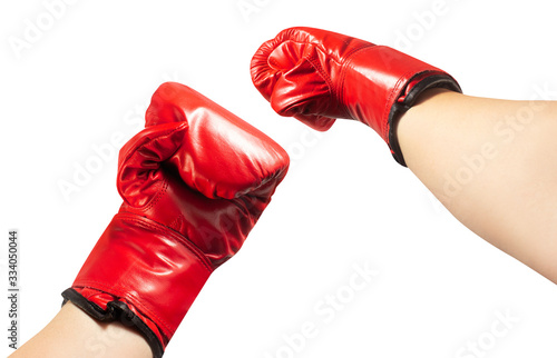 Isolated hands in red boxing gloves.