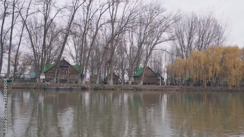Wooden houses along the river Wooden houses along the river