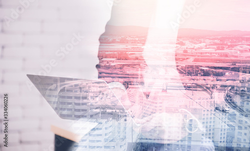 Double exposure of abstract technology and transportation business concept with aerial view background