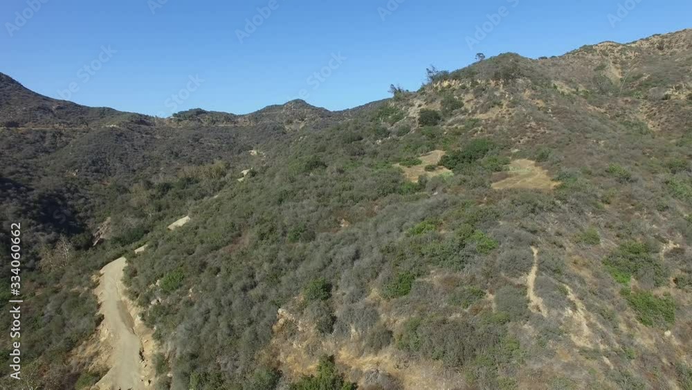 Aerial shot. Flight over Hollywood. Beautiful landscape of wonderful Hollywood hills. Amazing city in summertime. Shooting in 4K video. Cinematic Aerial Footage of Hollywood Los Angeles California USA Aerial shot. Flight over Hollywood. Beautiful landscape of wonderful Hollywood hills. Amazing city in summertime. Shooting in 4K video. Cinematic Aerial Footage of Hollywood Los Angeles California USA
