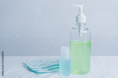 Coronavirus prevention medical surgical masks and hand sanitizer gel for hand hygiene corona virus protection. 