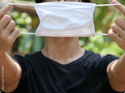 A man with his mask for protection.
