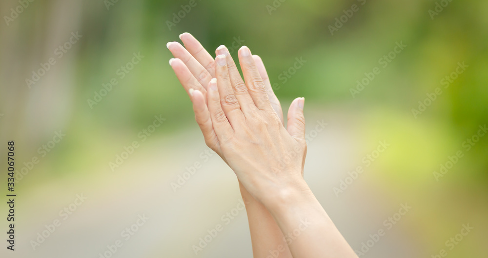 he hands of Asian women are washing their hands using disinfecting alcohol. Everyday life he hands of Asian women are washing their hands using disinfecting alcohol. Everyday life