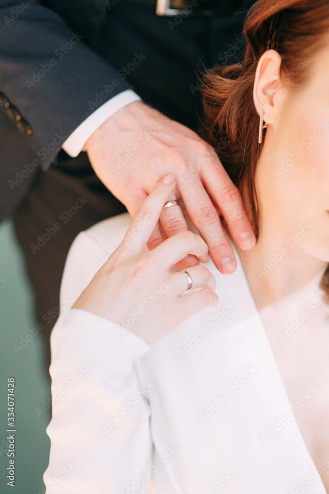 Obraz premium Stylish European wedding. Modern trends in the image of the bride. Bright portrait of the bride in the interior Studio.