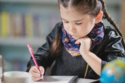 Wallpaper Mural foreigner girl learning,playing in the library with happy. Torontodigital.ca