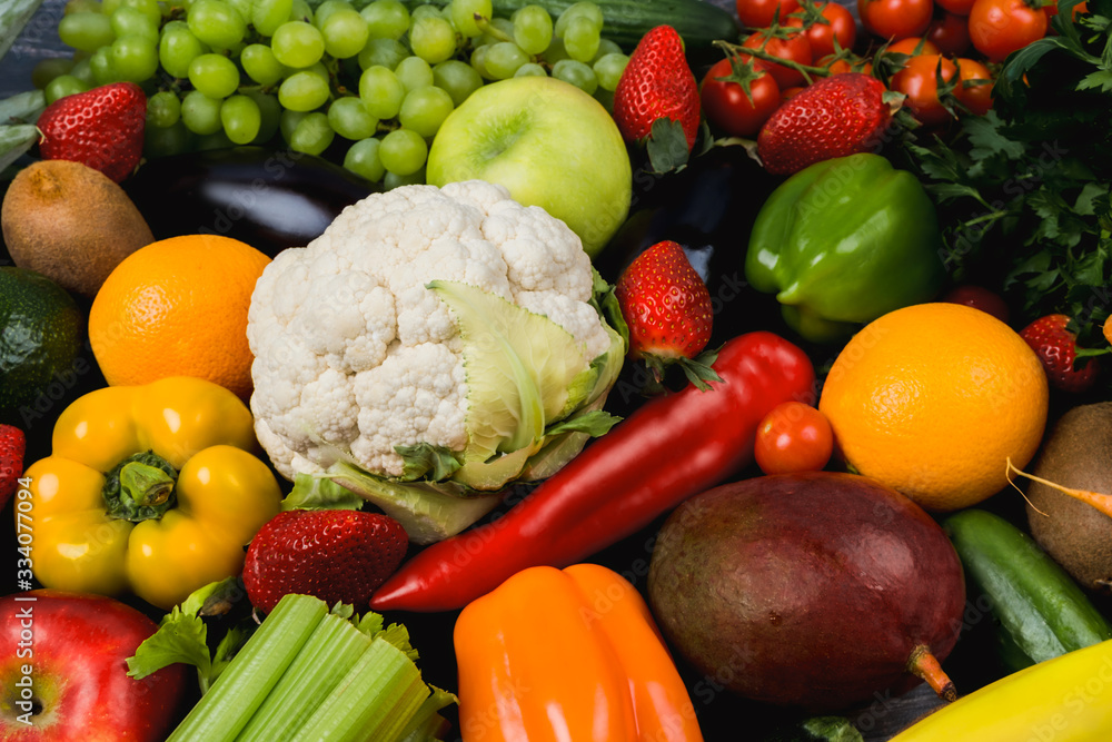 A lot of different fruits and vegetables on table A lot of different fruits and vegetables on table