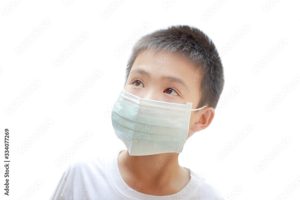 Asian boys with mask protection, COVID-19 or Virus protection concept Asian boys with mask protection, COVID-19 or Virus protection concept