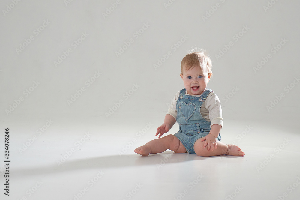 10 month old little baby learning to walk..Studio photography 10 month old little baby learning to walk..Studio photography