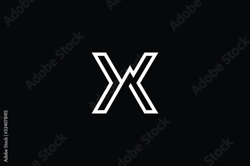 Minimal elegant monogram art logo. Outstanding professional trendy awesome artistic X XA AX initial based Alphabet icon logo. Premium Business logo White color on black background