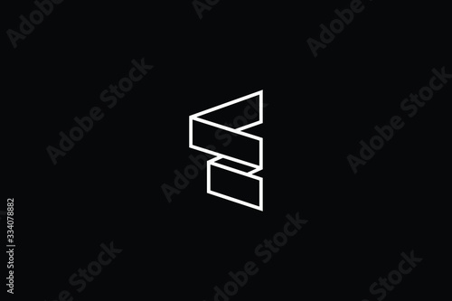 Minimal elegant monogram art logo. Outstanding professional trendy awesome artistic E EZ ZE initial based Alphabet icon logo. Premium Business logo White color on black background