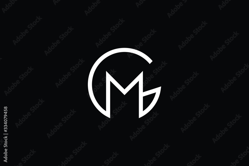Minimal elegant monogram art logo. Outstanding professional trendy awesome artistic GM MG initial based Alphabet icon logo. Premium Business logo White color on black background Minimal elegant monogram art logo. Outstanding professional trendy awesome artistic GM MG initial based Alphabet icon logo. Premium Business logo White color on black background