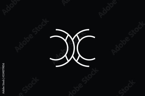 Minimal elegant monogram art logo. Outstanding professional trendy awesome artistic CC X XX initial based Alphabet icon logo. Premium Business logo White color on black background