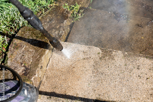Cleaning stairs with a high pressure cleaner