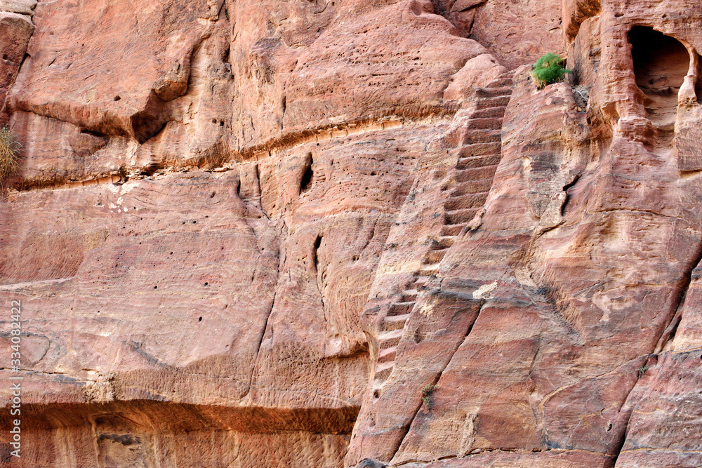Eroded surface of sandstone rocks in Petra, Jordan