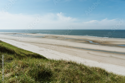 A panoramic view over the wide beach of Wangerooge  Germany on a sunny day