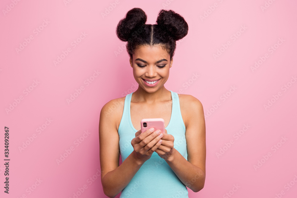 Close-up portrait of her she nice attractive lovely cute pretty charming cheerful cheery wavy-haired girl using modern technology device app 5g isolated over pink pastel color background Close-up portrait of her she nice attractive lovely cute pretty charming cheerful cheery wavy-haired girl using modern technology device app 5g isolated over pink pastel color background