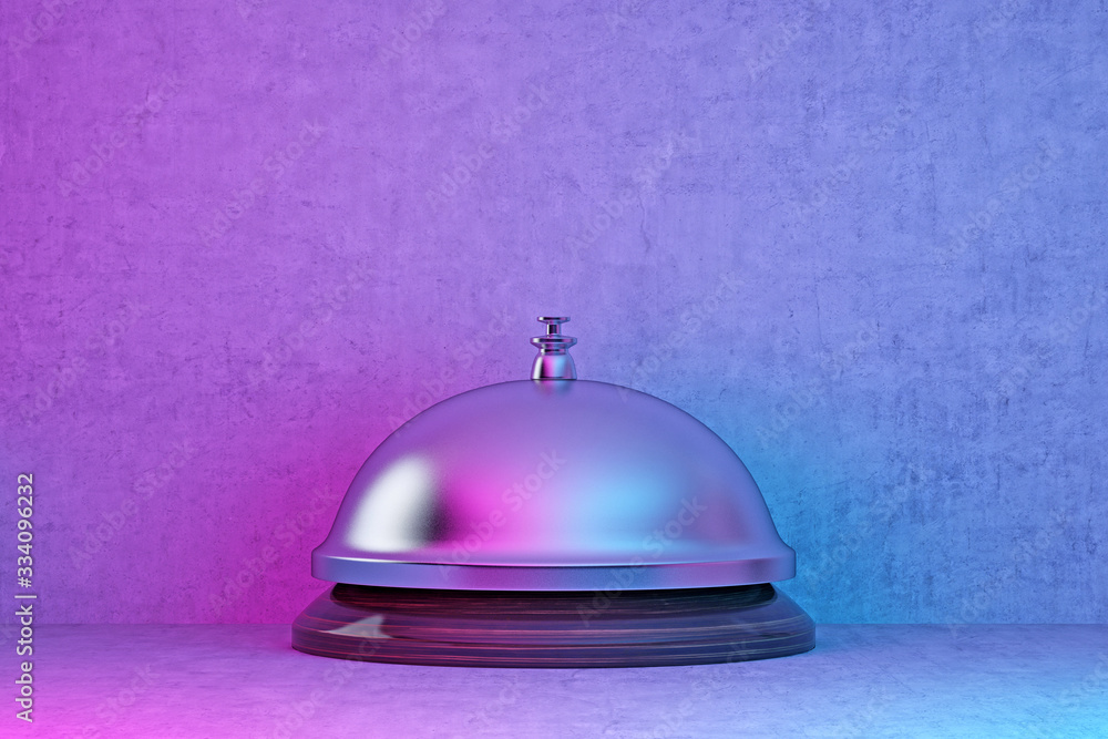 Obraz premium silver hotel bell in pink-blue lighting