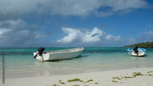 Floating boat in turquoise water