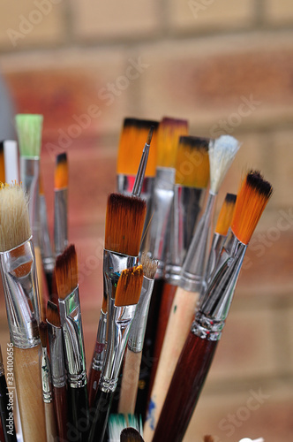 A variety of paint brushes with selective focus