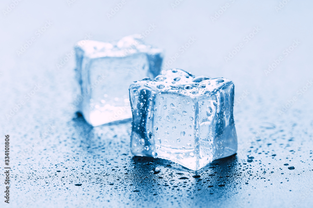 Pyramid of beautiful thawed ice cubes with drops of water Pyramid of beautiful thawed ice cubes with drops of water