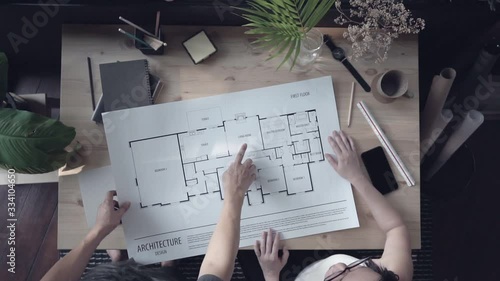 Young businessman and businesswoman architecture freelancer working from home lifestyle in modern home office, Quarantine isolation during the Coronavirus (COVID-19) health crisis