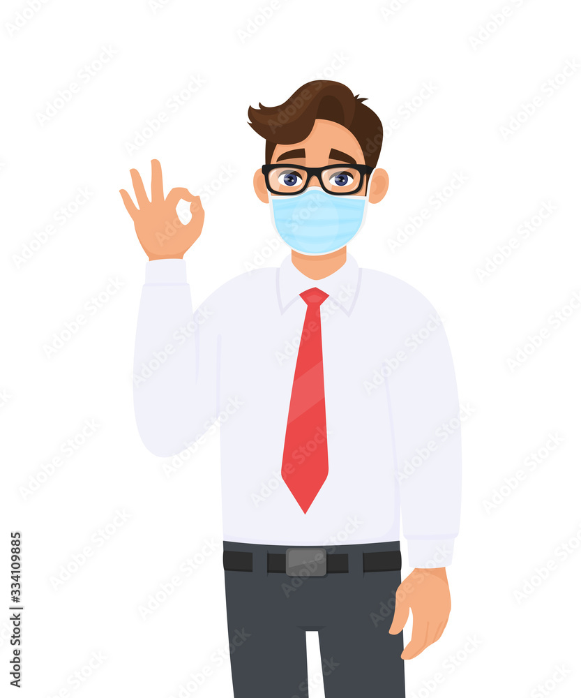 Young business man wearing face medical mask and showing okay, OK sign. Trendy person covering surgical mask and gesturing agree, success symbol with fingers. Cartoon design illustration in vector. Young business man wearing face medical mask and showing okay, OK sign. Trendy person covering surgical mask and gesturing agree, success symbol with fingers. Cartoon design illustration in vector.