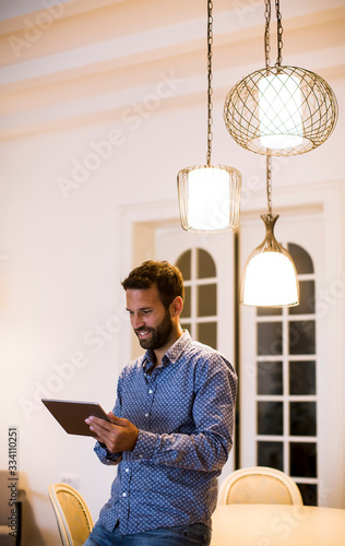 Young man working from home...