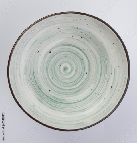 colorful ceramic plate on white background