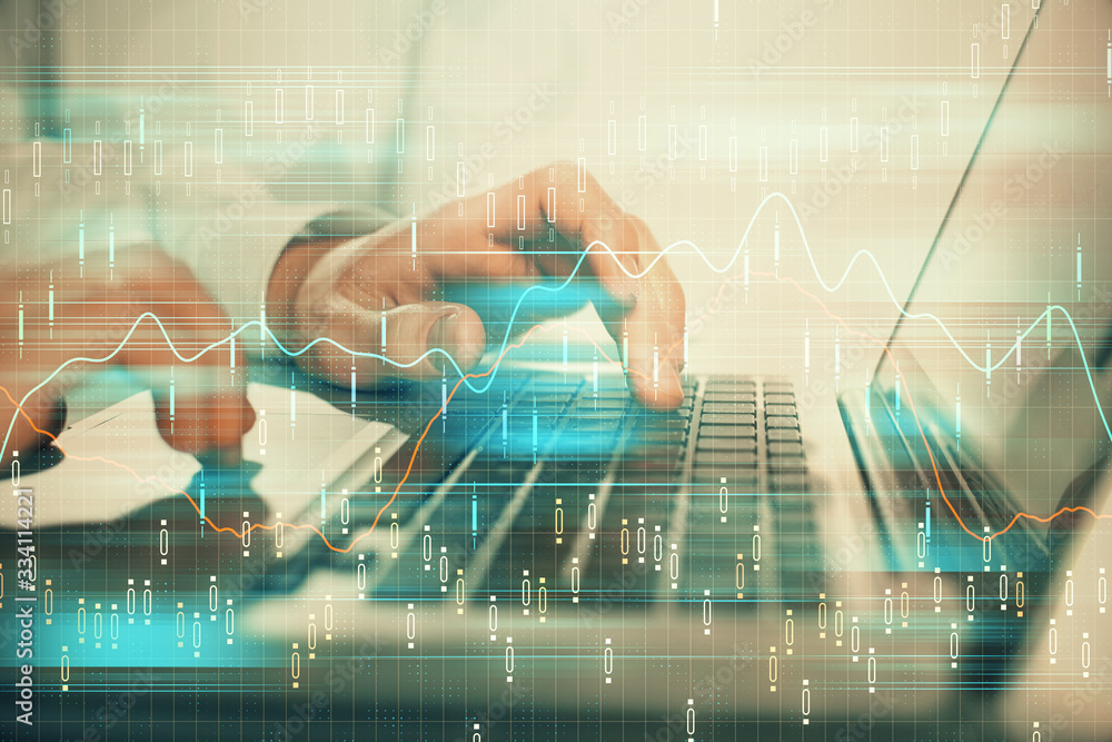 Double exposure of market chart with man working on computer on background. Concept of financial analysis. Double exposure of market chart with man working on computer on background. Concept of financial analysis.