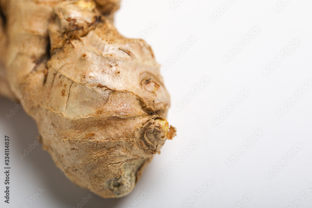 Fresh ginger on white background, herb medical concept Fresh ginger on white background, herb medical concept