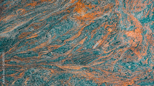Blue turquoise orange abstract marble granite natural stone texture background ( complementary colors )