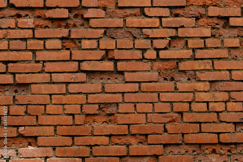 Obraz premium Weathered stained old brick wall background
