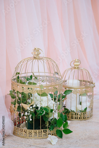 birdcage with flowers, wedding dinner