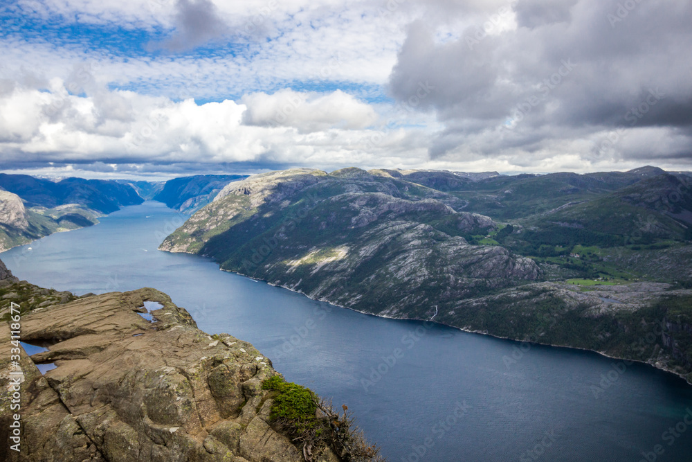view of the fjord and mountains from the Preikestolen viewpoint in Norway