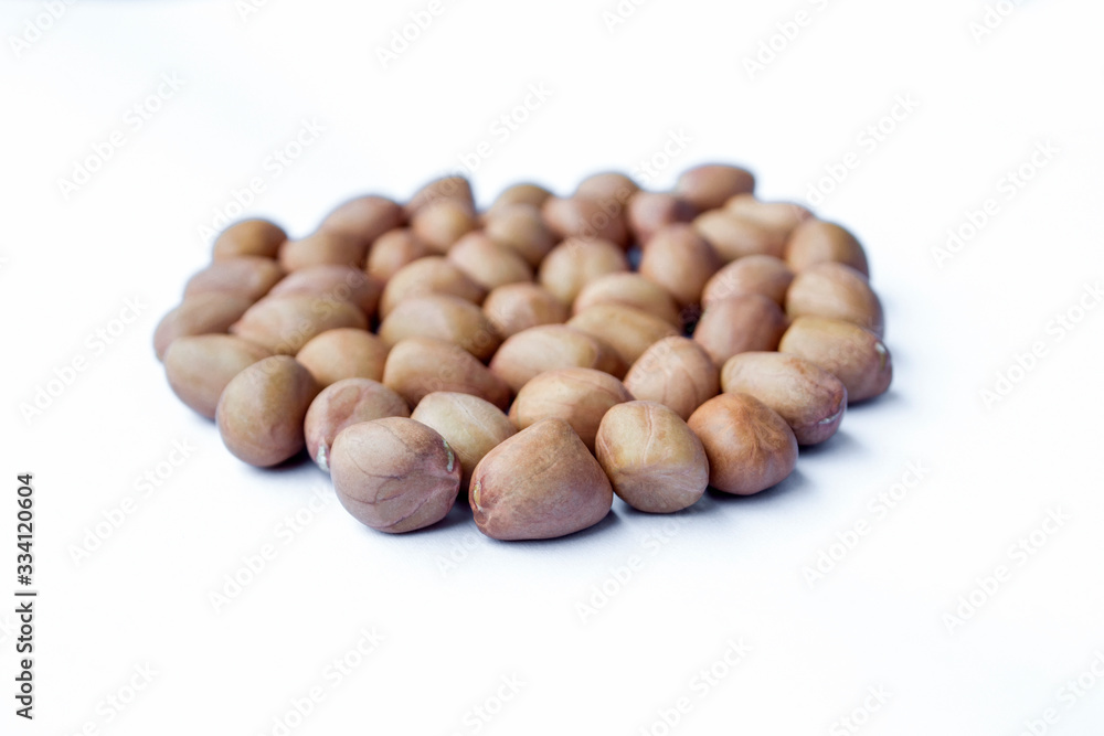 Peanut kernels isolated on a white background. Peanut kernels isolated on a white background.