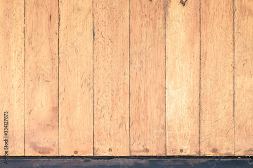 A table with an old wooden plank background