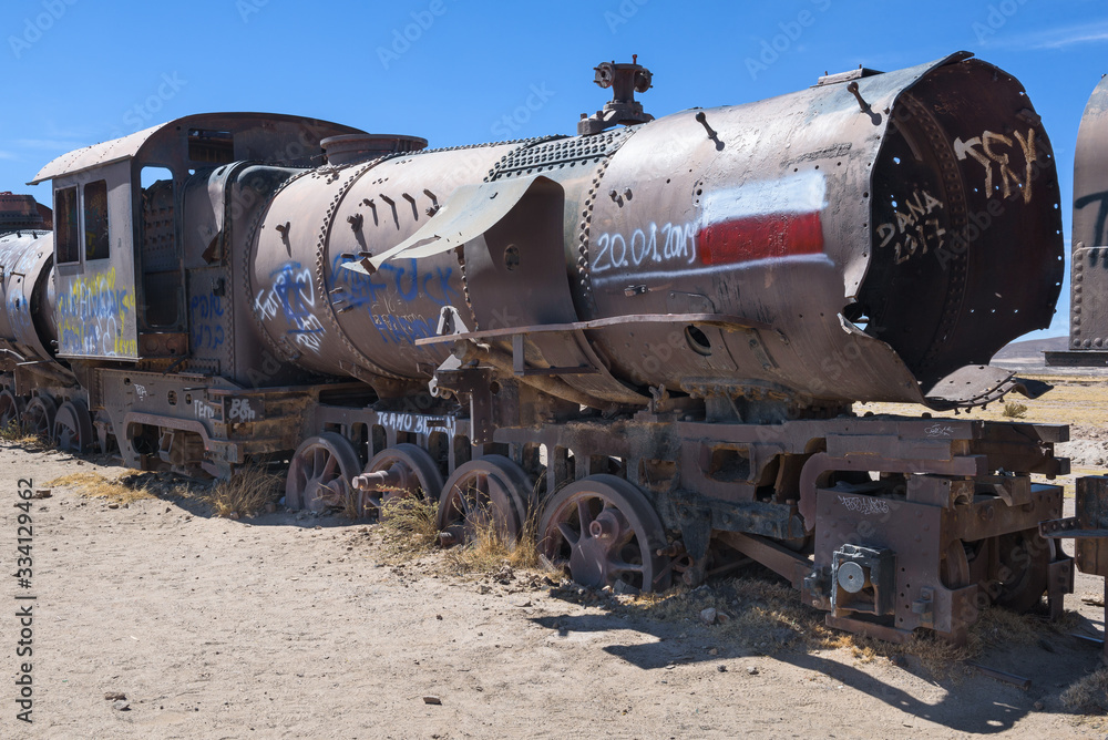 Rusty decayed train wrecks on the train cemetery near Uyuni, Bolivia