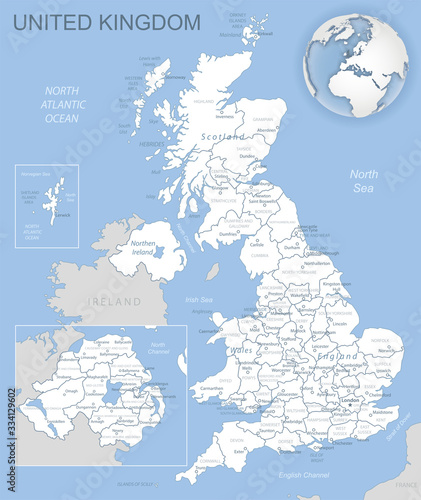 Blue-gray detailed map of United Kingdom and administrative divisions and location on the globe. Vector illustration