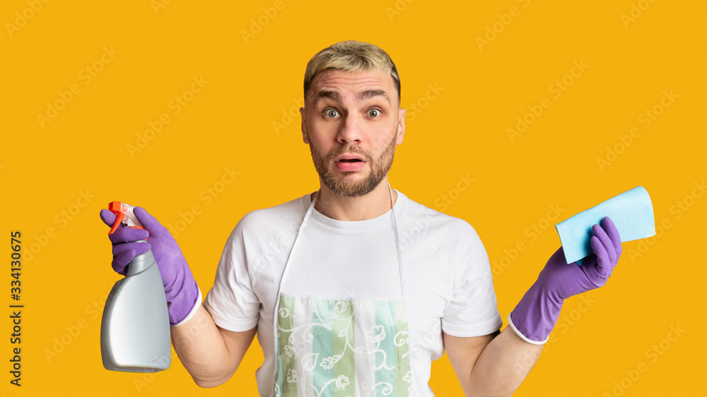 Man with spray and napkin spreads his hands Man with spray and napkin spreads his hands