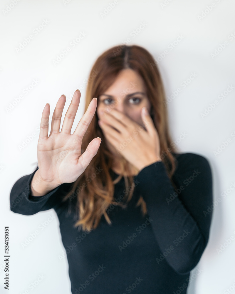 Women's hands as a signal to stop or refuse. Concept of stopping violence or abuse against women. Women's hands as a signal to stop or refuse. Concept of stopping violence or abuse against women.