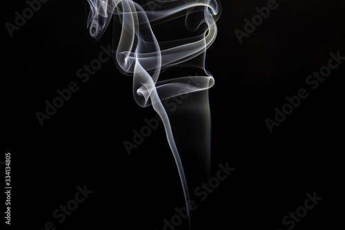swirls of smoke on a black background
