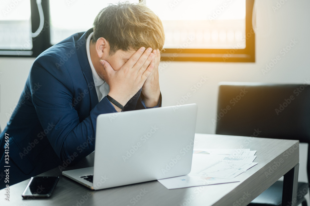 Businessmen who are stressed are tired at work. Businessmen who are stressed are tired at work.