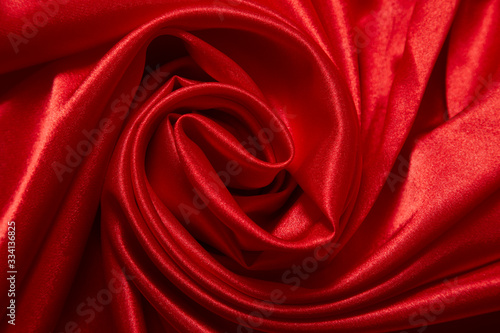 Luxury red satin smooth fabric background for celebration, ceremony, event invitation card or advertising poster