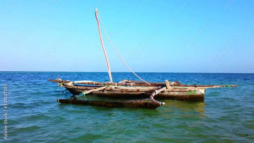 Traditional Boat at Diani Beach in Kenya, Africa Traditional Boat at Diani Beach in Kenya, Africa