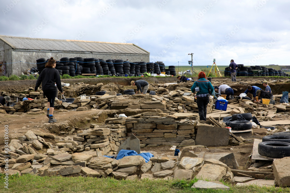 Brodgar - Orkney (Scotland), UK - August 06, 2018: Ness of Brodgar archaeological site, Orkney, Scotland, Highlands, United Kingdom Brodgar - Orkney (Scotland), UK - August 06, 2018: Ness of Brodgar archaeological site, Orkney, Scotland, Highlands, United Kingdom