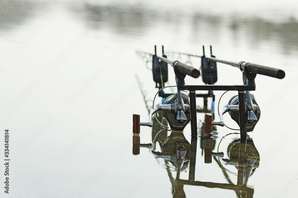carp stand for fishing rods on the lake carp stand for fishing rods on the lake