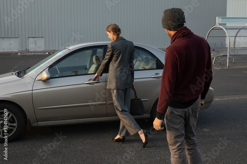 A man armed with a knife attacked a defenseless woman in a parking lot.