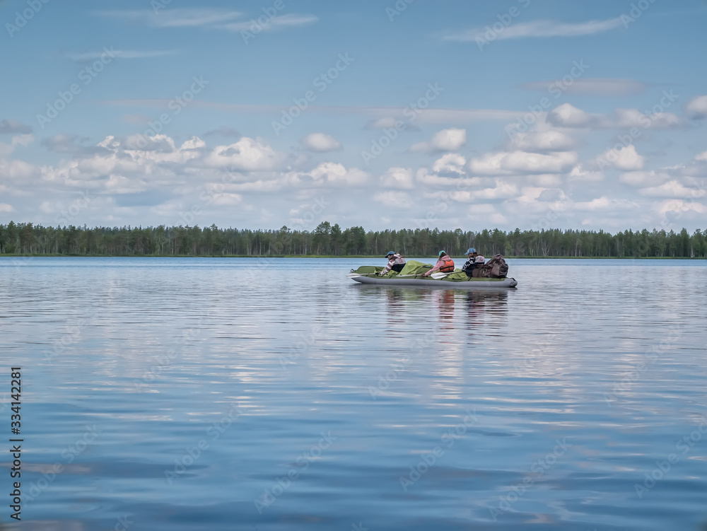 Landscape of Karelian nature with kayak in lake. Active extreme holidays in Karelia. Water rafting in North lakes and rivers