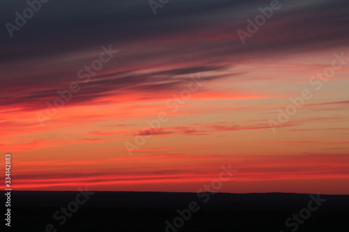 cirrus red clouds during sunset © Пётр Гребенев